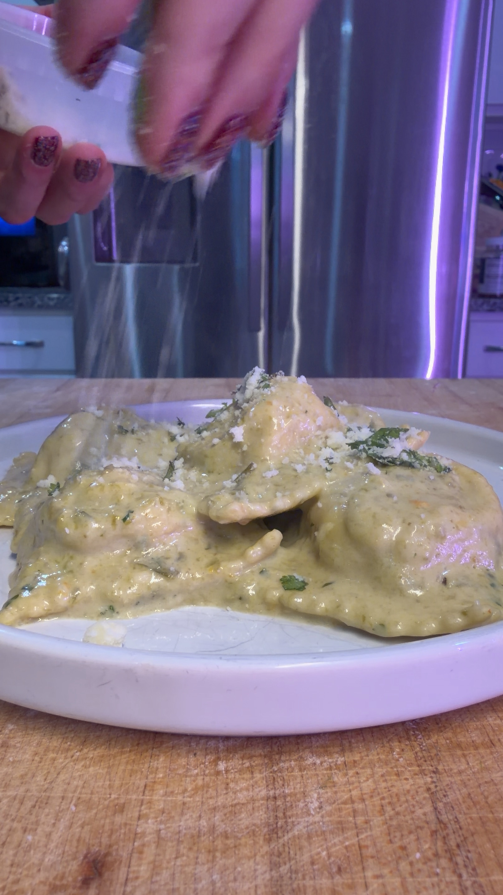 Homemade ravioli coated in creamy Hatch green chile sauce and finished with Cotija